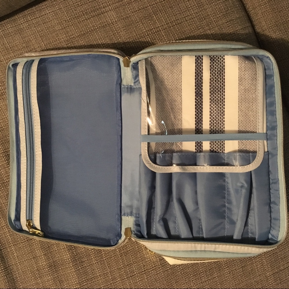 Two pocket makeup bag with brush holders